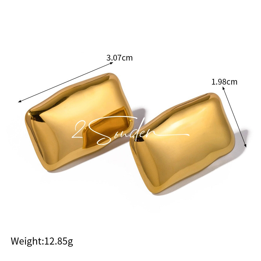 Classic Black and Gold Stud Earrings with Geometric Shape.