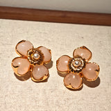 This is a pair of pink earrings made of recycled copper and ethically sourced natural stones. The size of each piece of earring is 3.7x3.7cm.