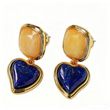 These French vintage-style drop earrings feature a geometric design, crafted with polished gold-tone metal settings. Each earring is adorned with two linked gemstone pendants: a cushion-cut square top and a heart-shaped bottom, made from natural agate in rich, varied hues like warm orange, deep blue, forest green, and vibrant red. The elegant, retro silhouette blends classic charm with a bold, colorful aesthetic, perfect for adding a statement touch to any look.