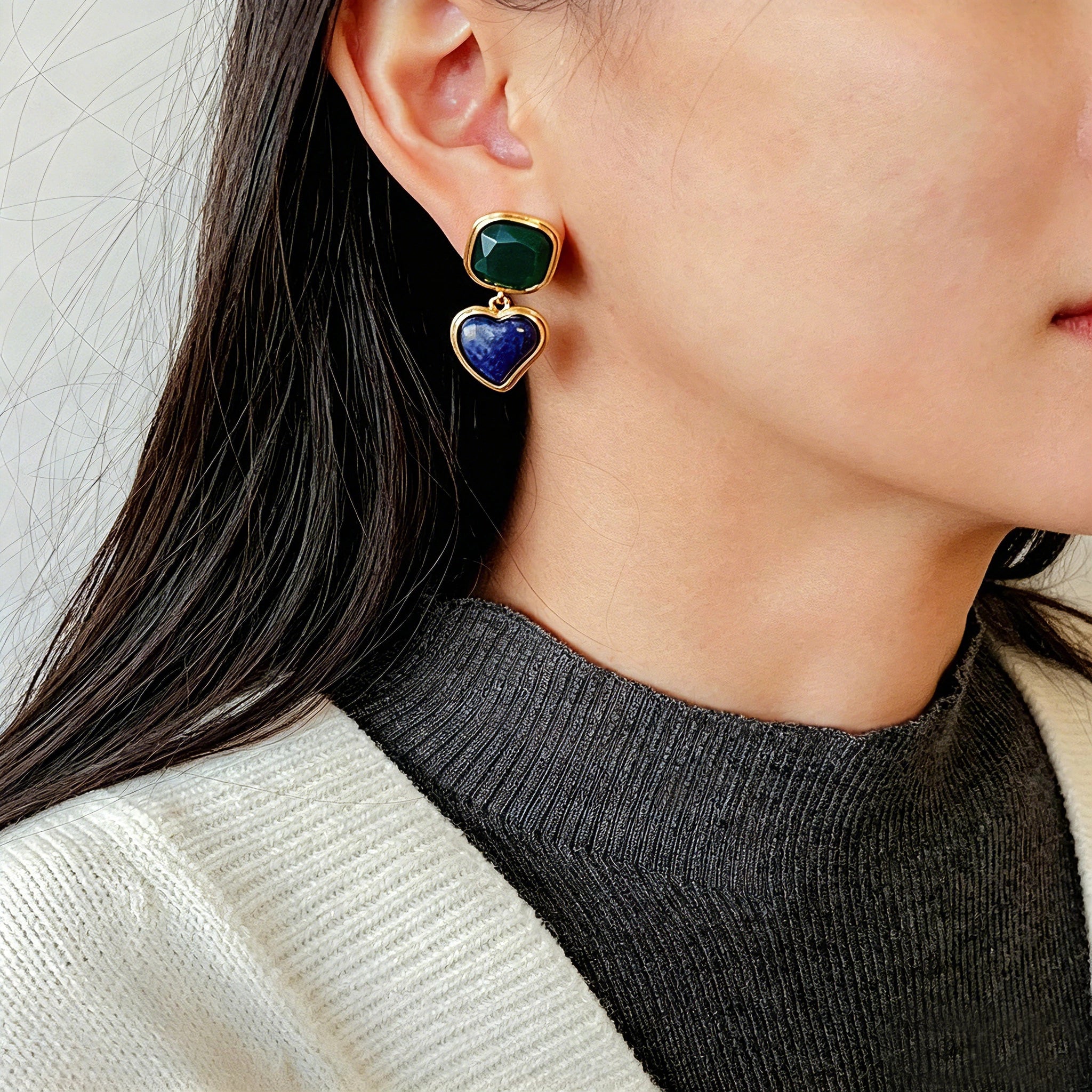 These French vintage-style drop earrings feature a geometric design, crafted with polished gold-tone metal settings. Each earring is adorned with two linked gemstone pendants: a cushion-cut square top and a heart-shaped bottom, made from natural agate in rich, varied hues like warm orange, deep blue, forest green, and vibrant red. The elegant, retro silhouette blends classic charm with a bold, colorful aesthetic, perfect for adding a statement touch to any look.