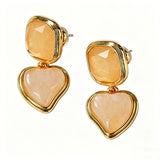 These French vintage-style drop earrings feature a geometric design, crafted with polished gold-tone metal settings. Each earring is adorned with two linked gemstone pendants: a cushion-cut square top and a heart-shaped bottom, made from natural agate in rich, varied hues like warm orange, deep blue, forest green, and vibrant red. The elegant, retro silhouette blends classic charm with a bold, colorful aesthetic, perfect for adding a statement touch to any look.