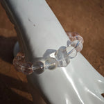This is a golden strawberry quartz and Clear Quartz bracelet, with unique transparency and elegance.