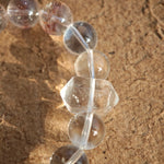 This is a golden strawberry quartz and Clear Quartz bracelet, with unique transparency and elegance.