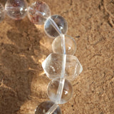 This is a golden strawberry quartz and Clear Quartz bracelet, with unique transparency and elegance.