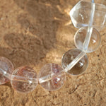 This is a golden strawberry quartz and Clear Quartz bracelet, with unique transparency and elegance.