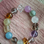 These 13-13.8 mm stones paint a seamless horizon where sea meets sky, dusk meets dawn.