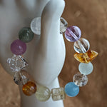 Harmony Treasures unites sky, spirit, sun, earth, and air in 13 mm crystal harmony.