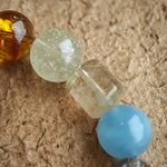 Soft sea tones, noble purples, warm golds, tender greens, and airy whites flow together like silk.