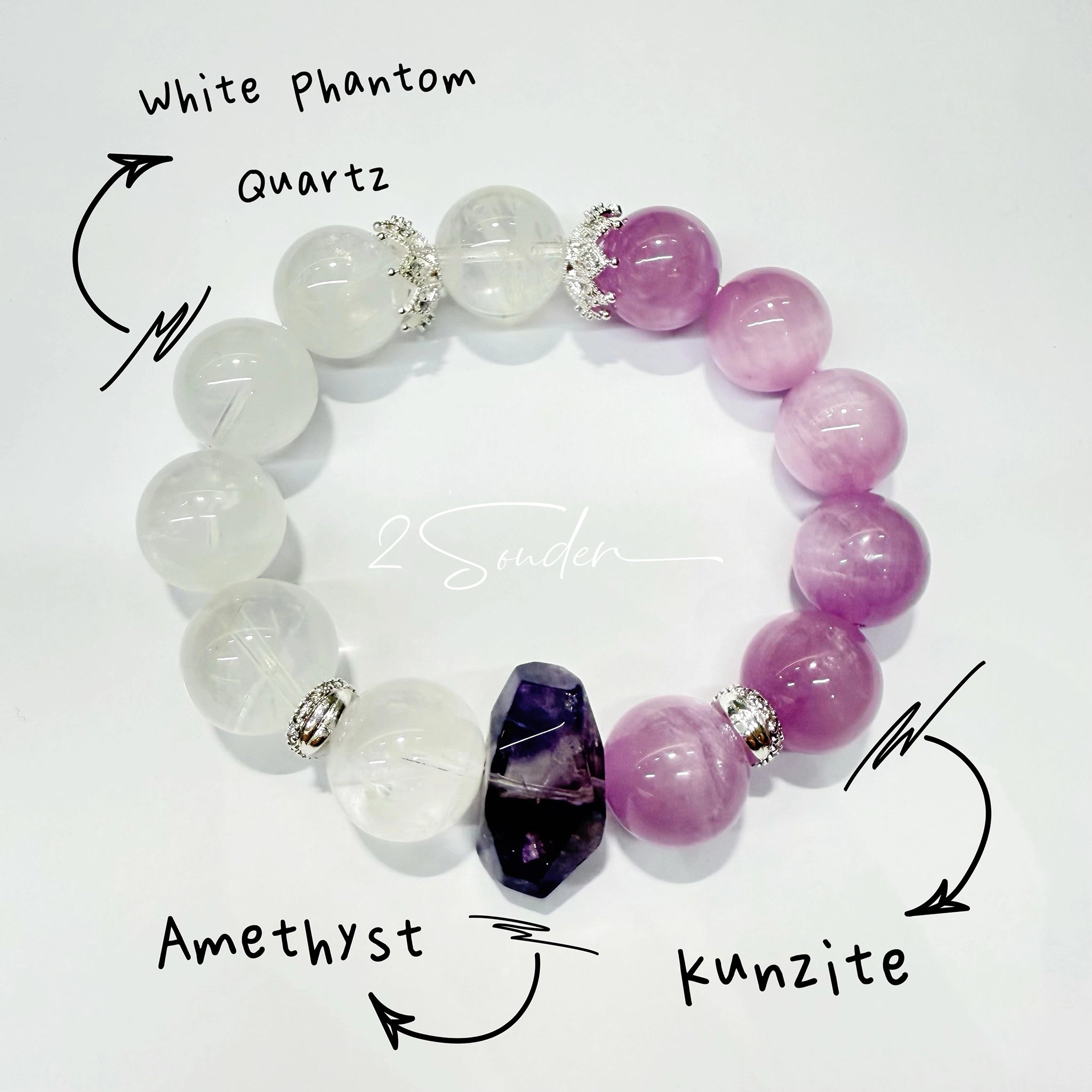 This is a multi gemstones bracelet consists of Kunzite, White Phantom Quartzs and Raw Amethysts. The beads are between 14.5 and 15.5mm. And in the bracelets, there are  hypoallergenic silver spacers and floral accents.