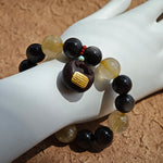 Luxurious yet untamed: silver obsidian shields, golden rutile ignites, agarwood calms, Nanhong commands.