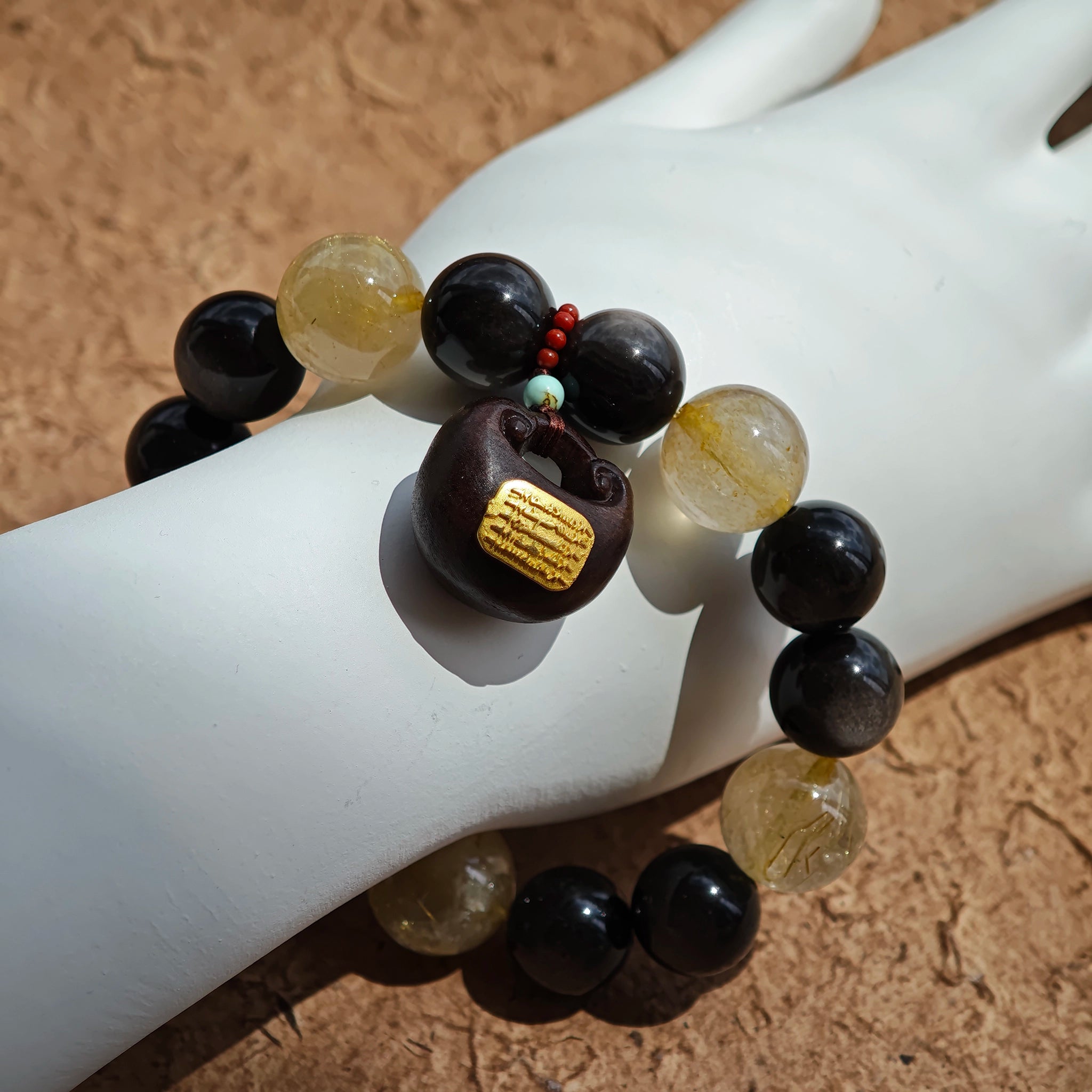 Luxurious yet untamed: silver obsidian shields, golden rutile ignites, agarwood calms, Nanhong commands.