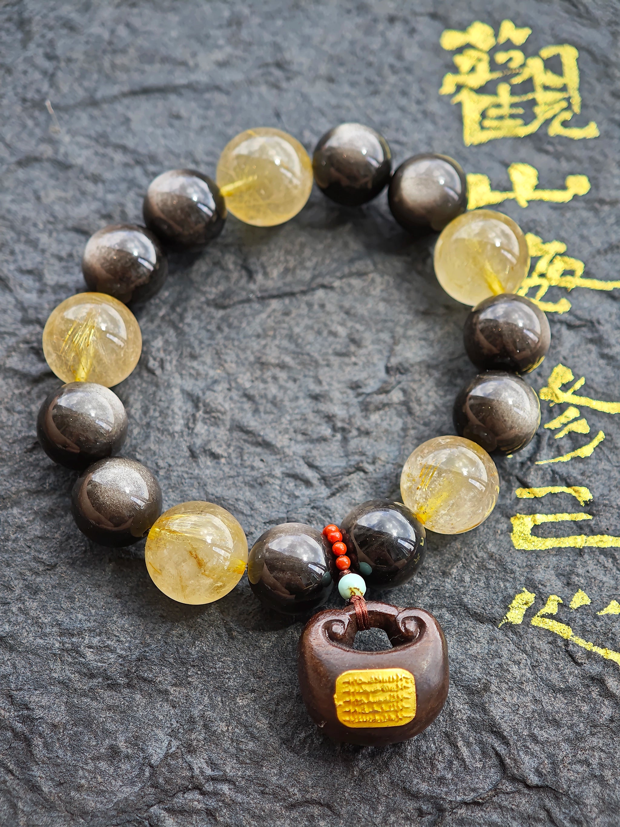A tactile epic: smooth obsidian, glinting rutile, scented agarwood, polished Nanhong—luxury rooted in raw force.
