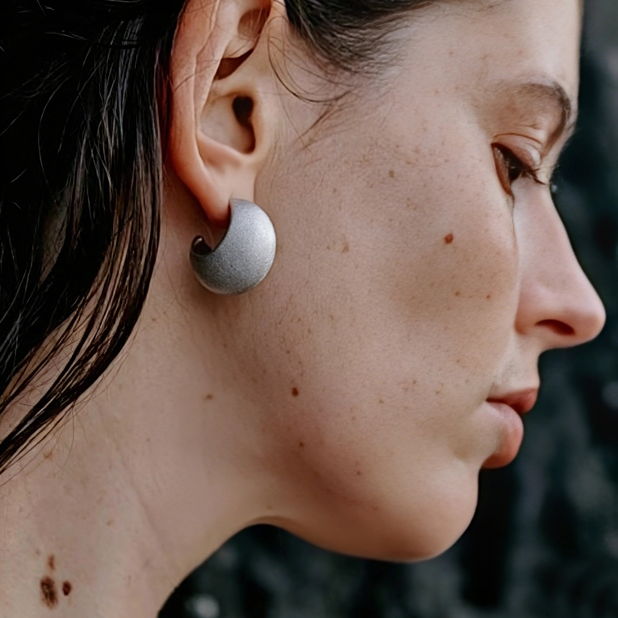 These minimalist high-end stud earrings feature a plump crescent C-shaped design with delicate frosted texture on the whole surface. They are available in two classic colors: elegant gold and versatile silver. With smooth curved lines, the earrings bring understated luxury and fashionable daily wear sense.