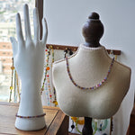 This is a minimalist necklace bracelet set with Peanut shape glass beads.