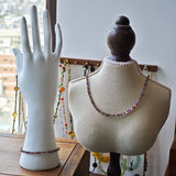 This is a minimalist necklace bracelet set with Peanut shape glass beads.