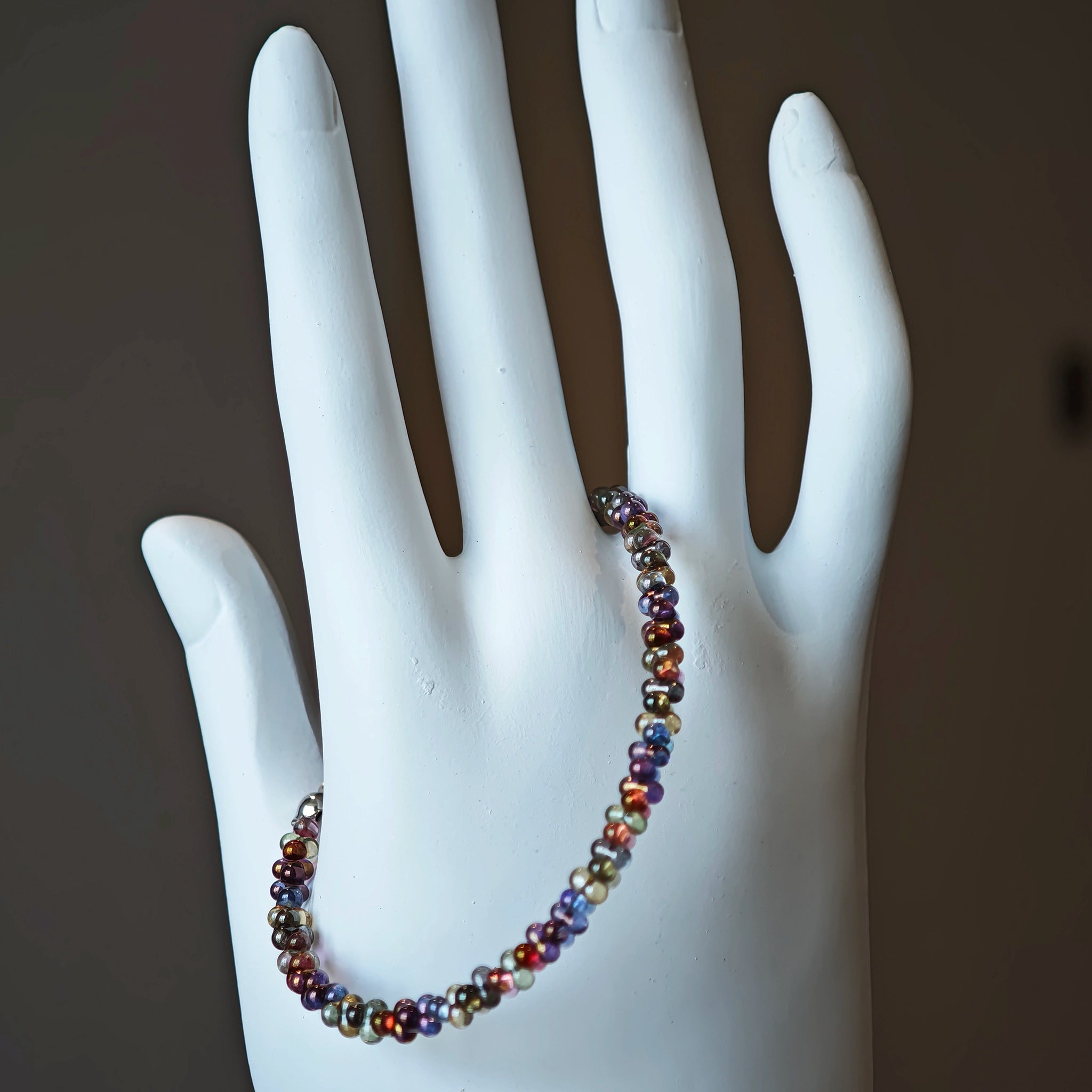 This is a minimalist necklace bracelet set with Peanut shape glass beads.