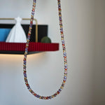 This is a minimalist necklace bracelet set with Peanut shape glass beads.