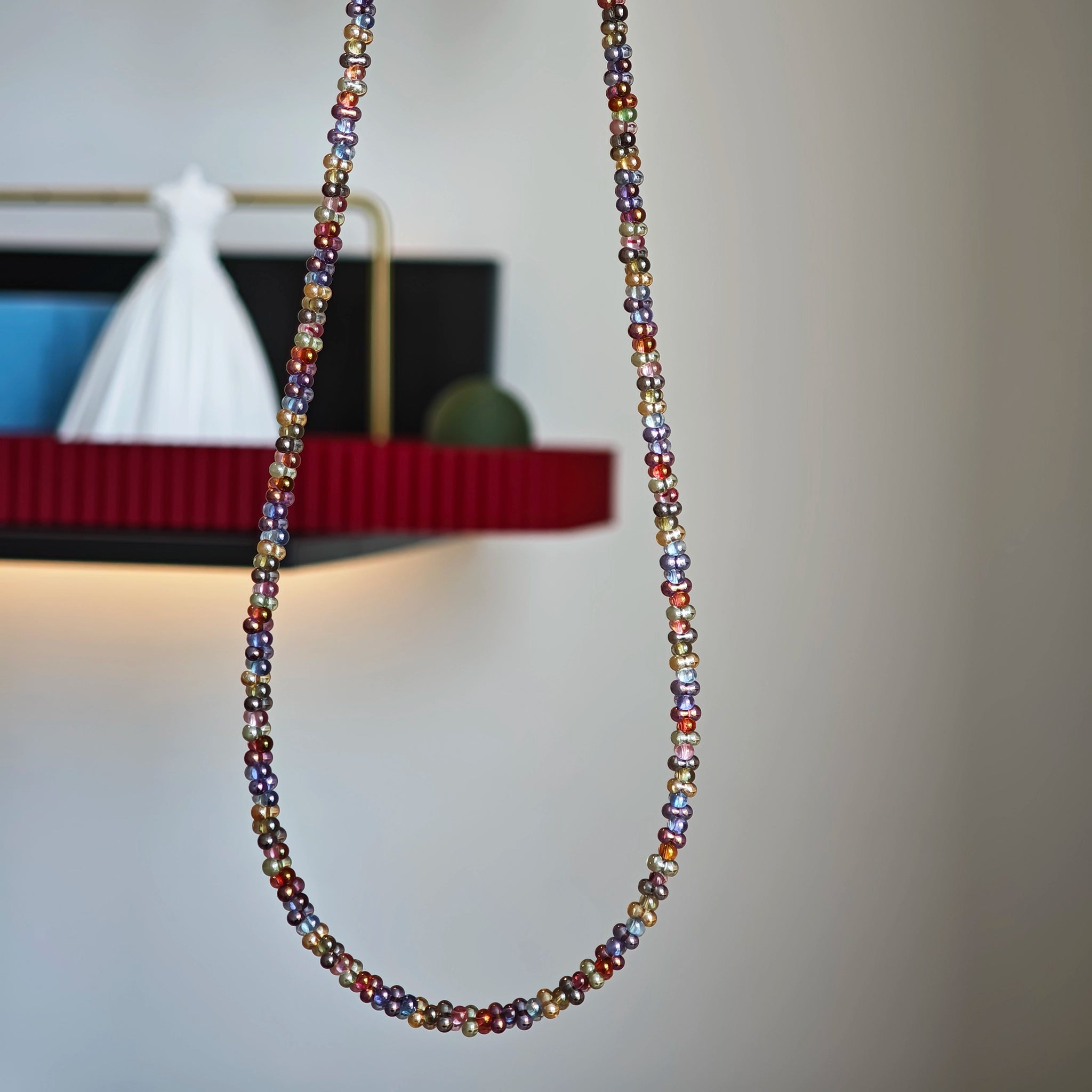 This is a minimalist necklace bracelet set with Peanut shape glass beads.