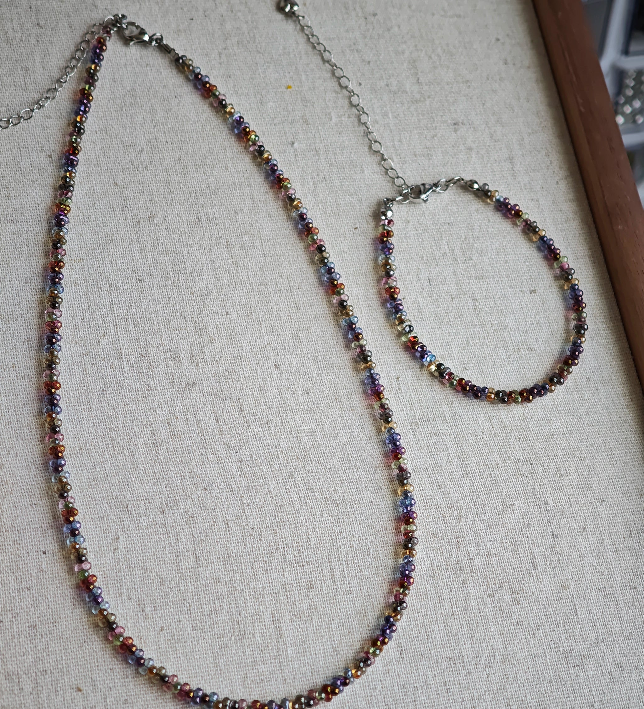 This is a minimalist necklace bracelet set with Peanut shape glass beads.