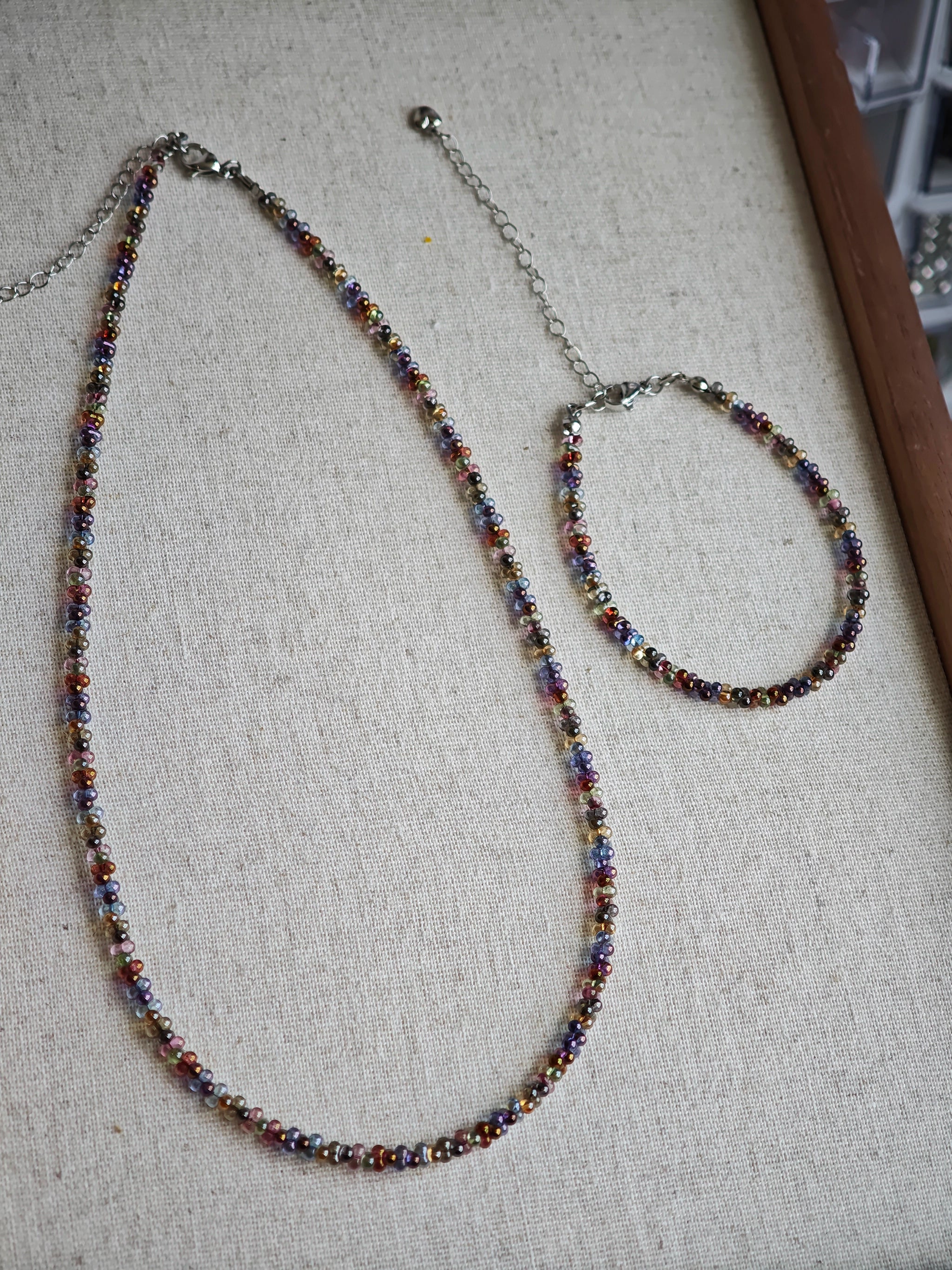 This is a minimalist necklace bracelet set with Peanut shape glass beads.
