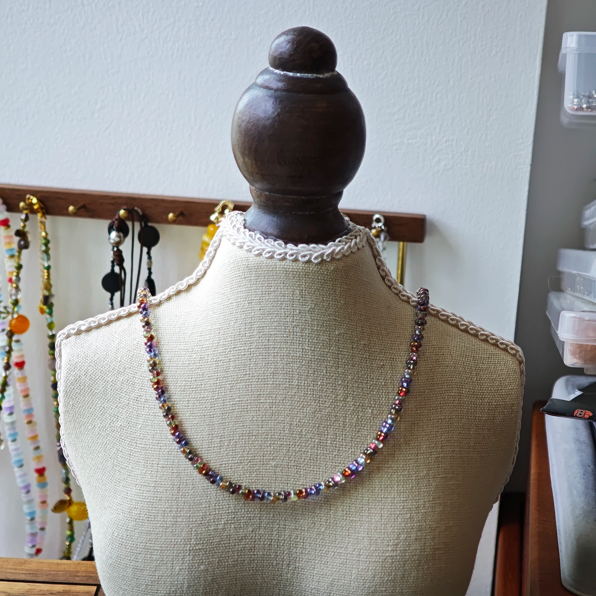 This is a minimalist necklace bracelet set with Peanut shape glass beads.