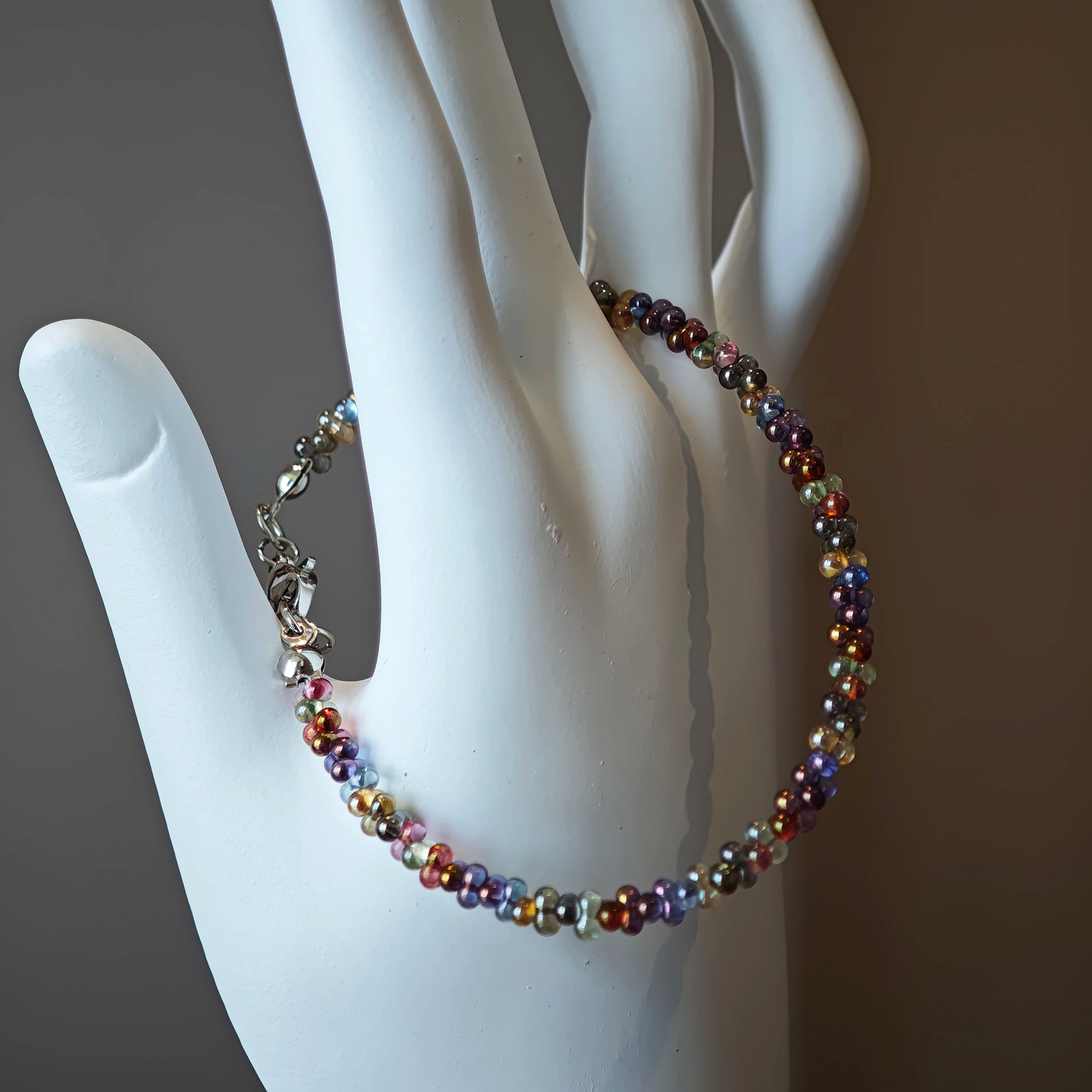 This is a minimalist necklace bracelet set with Peanut shape glass beads.