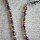 This is a minimalist necklace bracelet set with Peanut shape glass beads.