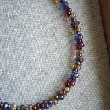 This is a minimalist necklace bracelet set with Peanut shape glass beads.