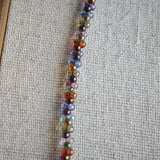 This is a minimalist necklace bracelet set with Peanut shape glass beads.