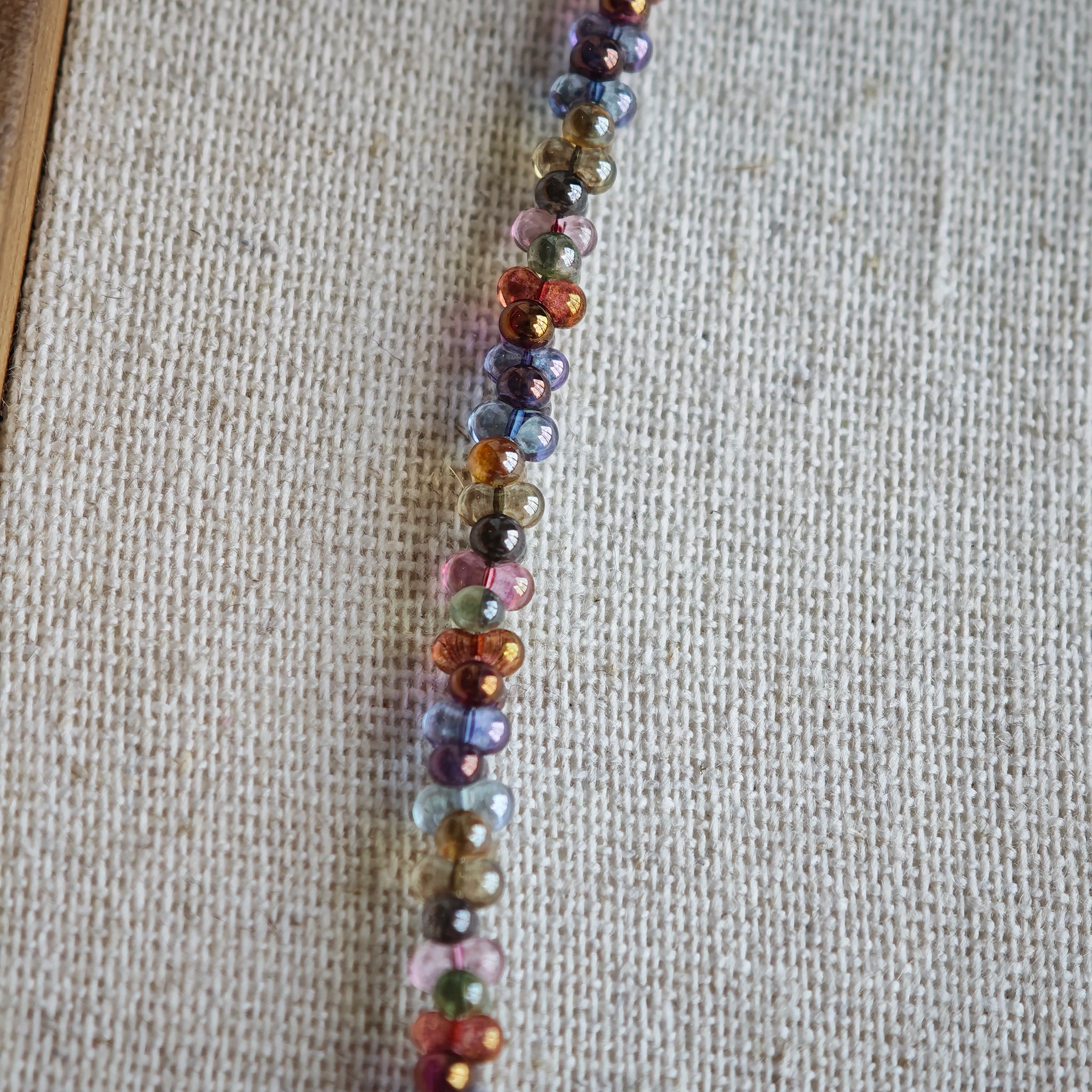 This is a minimalist necklace bracelet set with Peanut shape glass beads.