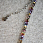 This is a minimalist necklace bracelet set with Peanut shape glass beads.