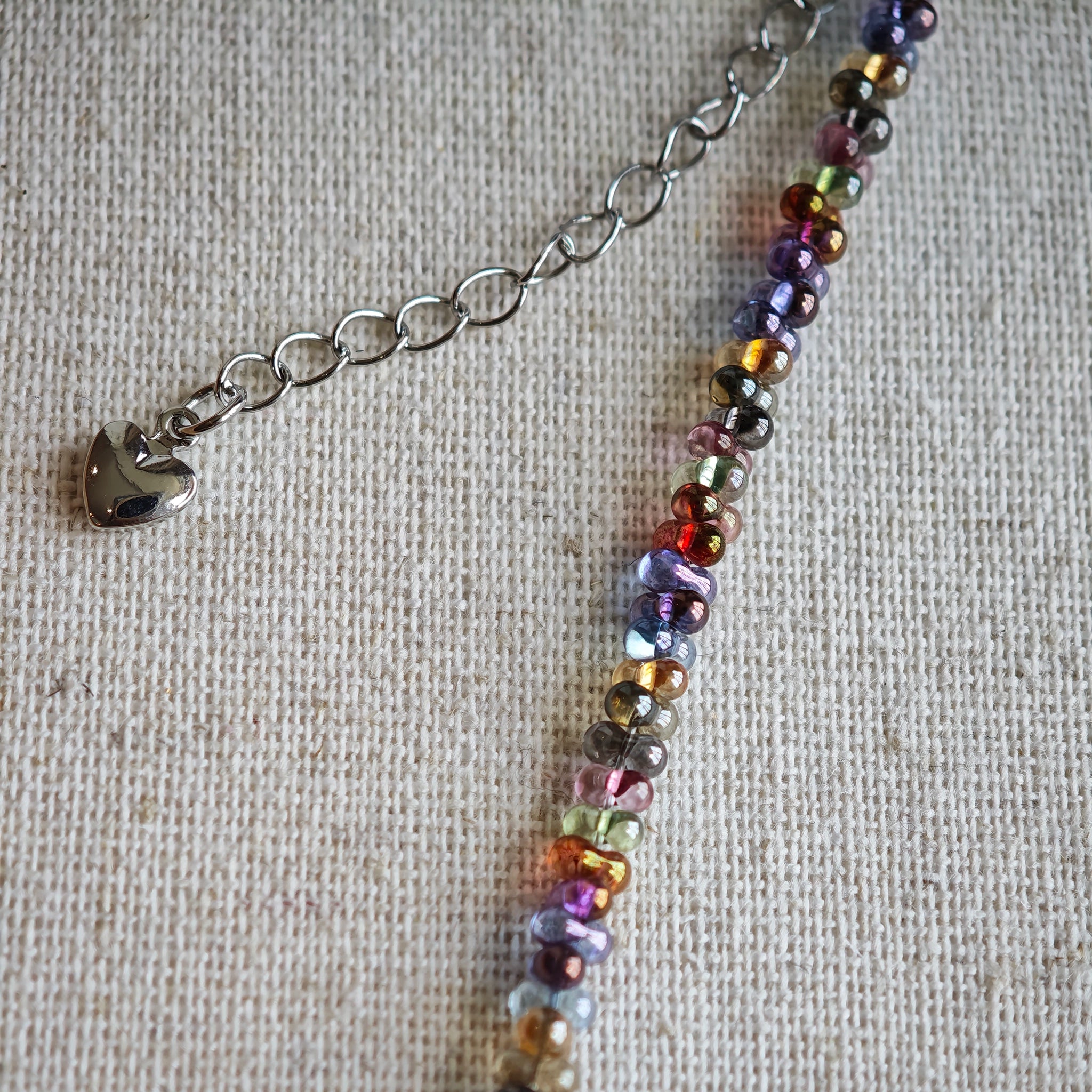 This is a minimalist necklace bracelet set with Peanut shape glass beads.