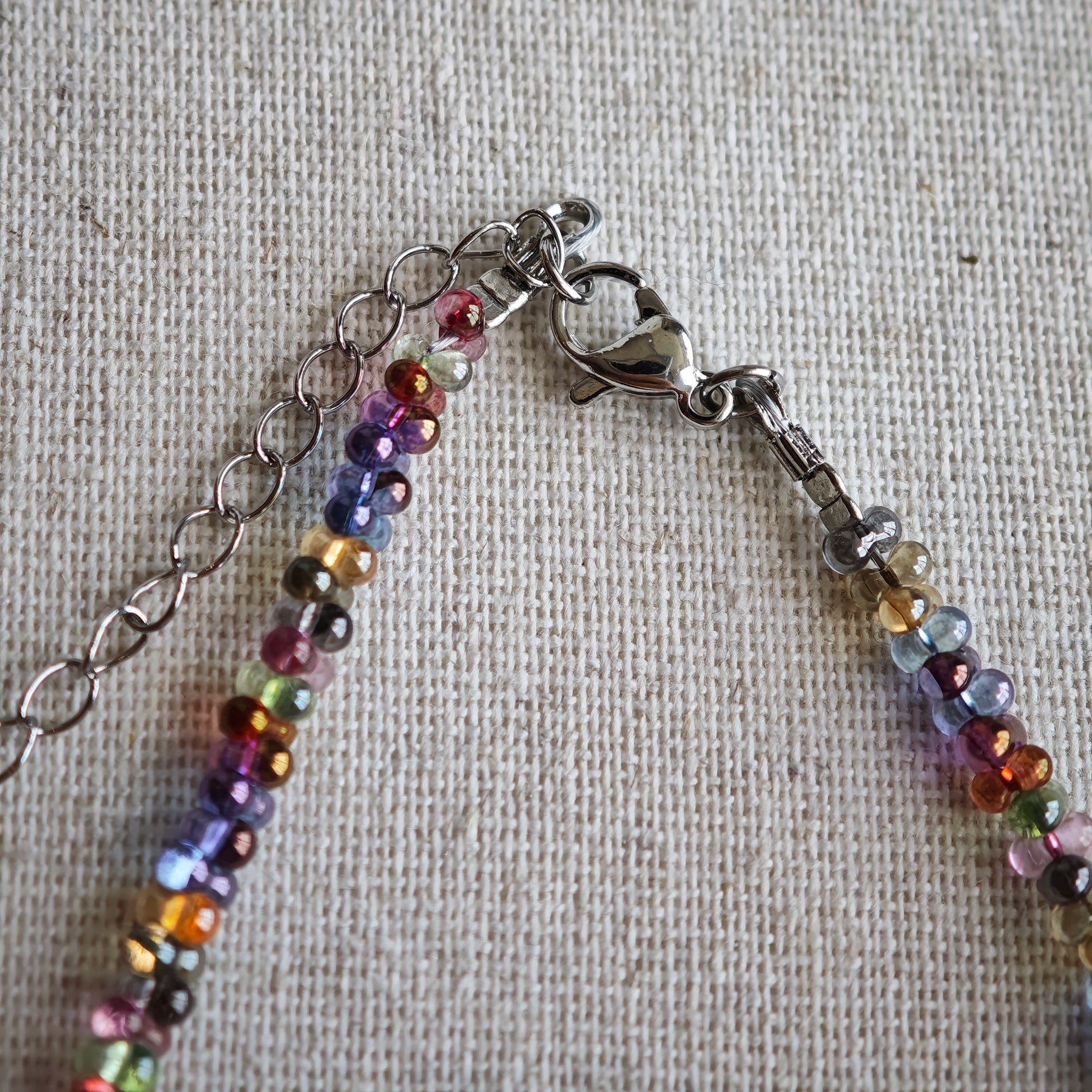 This is a minimalist necklace bracelet set with Peanut shape glass beads.