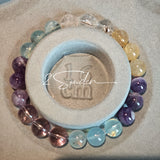 This is a gemstone bracelet consists of different gemstones. They are blue aquamarines, purple amethysts, yellow citrines and transparent clear quartz. It's with 16cm circumference.