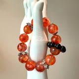 This is a original gemstone bracelet consists of Red Hematoid Quartz. In the bracelet, there is a Black Onyx loop. The bracelet is in red color, which looks very warm and vibrant.