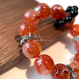 This is a original gemstone bracelet consists of Red Hematoid Quartz. In the bracelet, there is a Black Onyx loop. The bracelet is in red color, which looks very warm and vibrant.