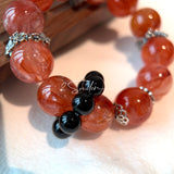 This is a original gemstone bracelet consists of Red Hematoid Quartz. In the bracelet, there is a Black Onyx loop. The bracelet is in red color, which looks very warm and vibrant.