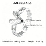 This is an adjustable open ring crafted from S925 sterling silver. It features a modern chain-link band paired with a textured heart-shaped centerpiece, boasting a "crushed ice" finish that delivers a sparkling, dimensional look. The polished silver tone lends a sleek, contemporary vibe to this versatile piece.