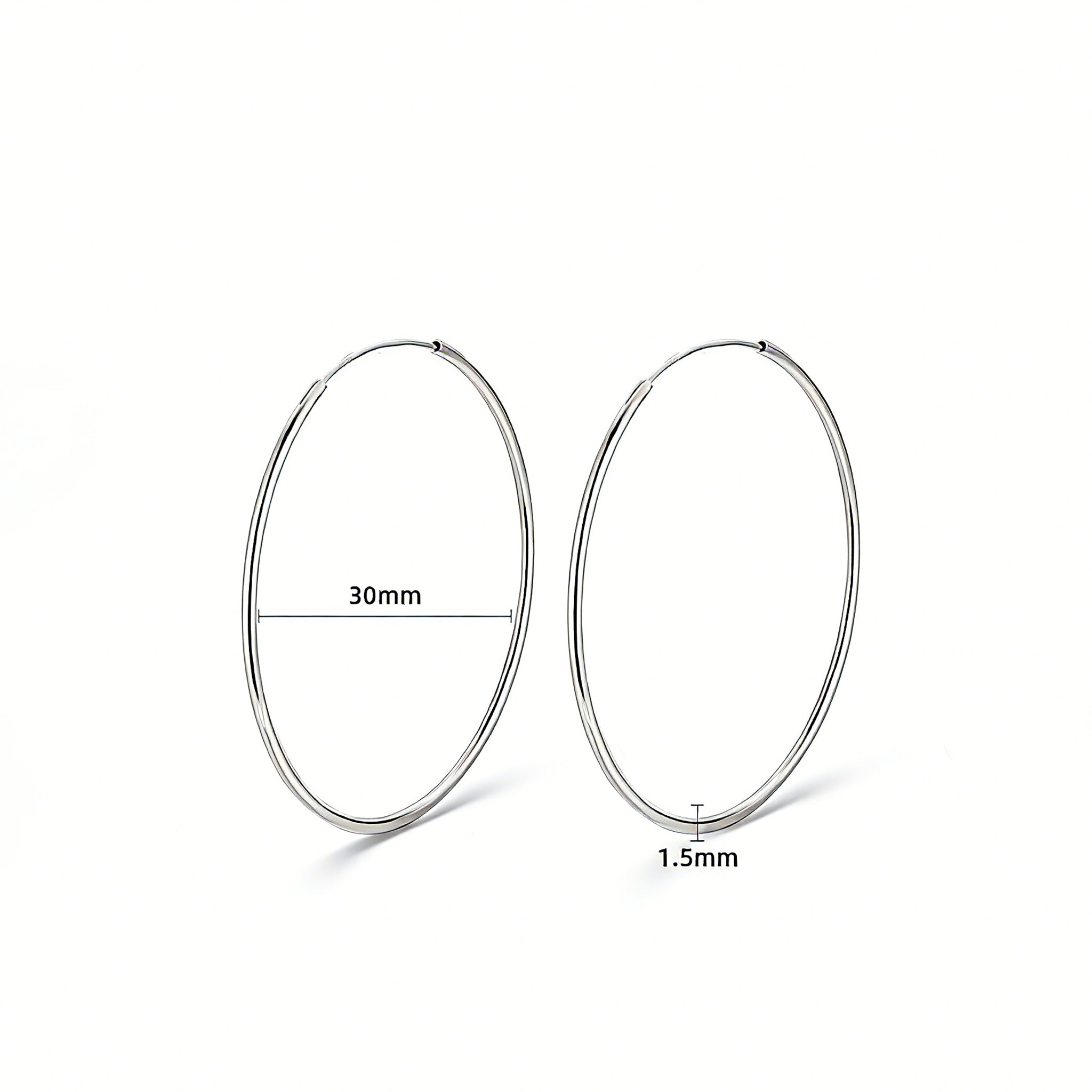 These S925 sterling silver hoop earrings feature a sleek, polished circular design with a smooth, reflective finish. They showcase a classic minimalist silhouette with a seamless, slender wire construction that exudes understated elegance. The polished surface catches light beautifully, highlighting their timeless and versatile appeal.