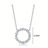 This S925 silver necklace features a delicate circular pendant encrusted with shimmering moissanite stones, forming an elegant open-circle silhouette. The slender silver chain complements the pendant perfectly, lending a refined and timeless charm to the piece. Its minimalist yet sparkling design makes it a versatile accessory for various occasions.