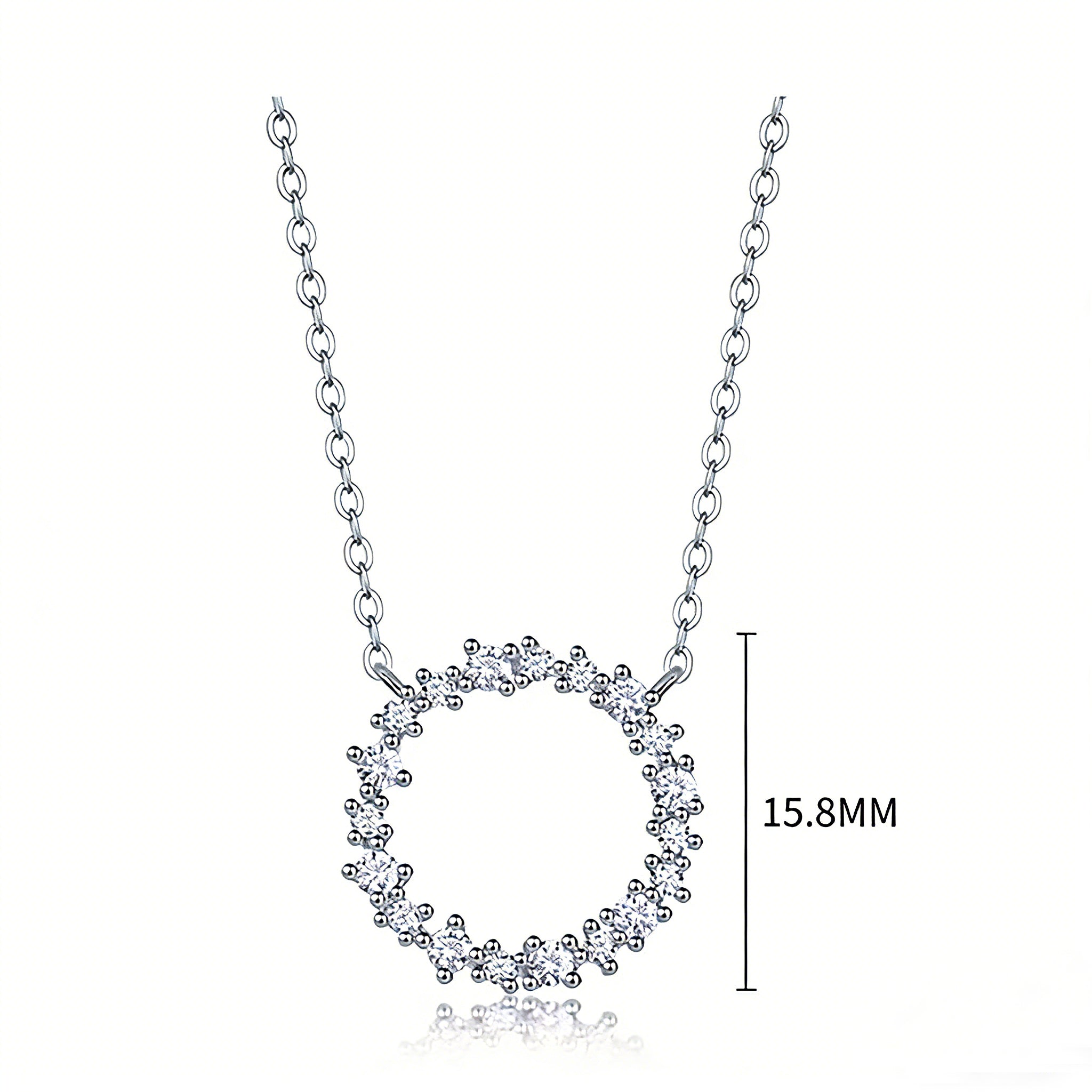This S925 silver necklace features a delicate circular pendant encrusted with shimmering moissanite stones, forming an elegant open-circle silhouette. The slender silver chain complements the pendant perfectly, lending a refined and timeless charm to the piece. Its minimalist yet sparkling design makes it a versatile accessory for various occasions.
