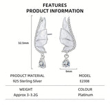 These S925 sterling silver earrings are designed in the shape of delicate butterfly wings, with a resin craft on the wing surfaces and a row of shimmering cubic zirconia along the edges. A teardrop-cut clear gemstone dangles elegantly from the bottom of each wing, adding a graceful and sparkling touch to the overall design.