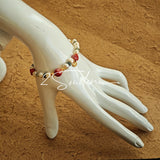 This is a bracelet made of S925 sterling silver, red cinnabars, green moss agates and natural white pearls. It's 16cm long with a 3cm extended chain. It comes with a lobster clasp which is easy to be used.