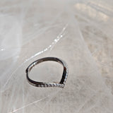 This S925 silver women's ring features an elegant crown-shaped heart design, pavé-set with sparkling moissanite stones along its curved band for a luminous, romantic appearance. Its open adjustable band allows for a comfortable, personalized fit on different finger sizes, blending delicate craftsmanship with timeless charm.