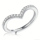 This S925 silver women's ring features an elegant crown-shaped heart design, pavé-set with sparkling moissanite stones along its curved band for a luminous, romantic appearance. Its open adjustable band allows for a comfortable, personalized fit on different finger sizes, blending delicate craftsmanship with timeless charm.