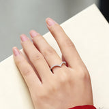This S925 silver women's ring features an elegant crown-shaped heart design, pavé-set with sparkling moissanite stones along its curved band for a luminous, romantic appearance. Its open adjustable band allows for a comfortable, personalized fit on different finger sizes, blending delicate craftsmanship with timeless charm.