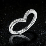 This S925 silver women's ring features an elegant crown-shaped heart design, pavé-set with sparkling moissanite stones along its curved band for a luminous, romantic appearance. Its open adjustable band allows for a comfortable, personalized fit on different finger sizes, blending delicate craftsmanship with timeless charm.