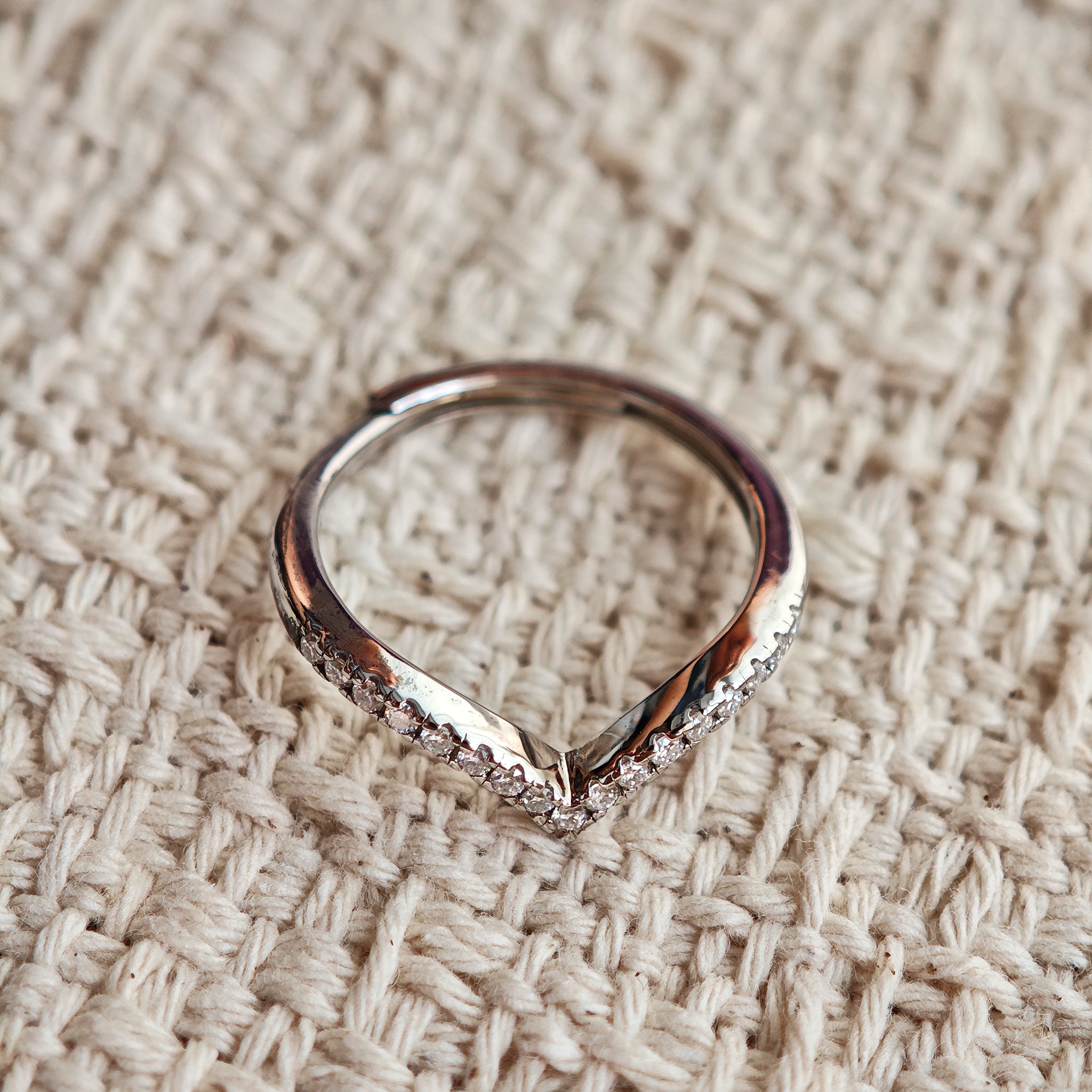 This S925 silver women's ring features an elegant crown-shaped heart design, pavé-set with sparkling moissanite stones along its curved band for a luminous, romantic appearance. Its open adjustable band allows for a comfortable, personalized fit on different finger sizes, blending delicate craftsmanship with timeless charm.