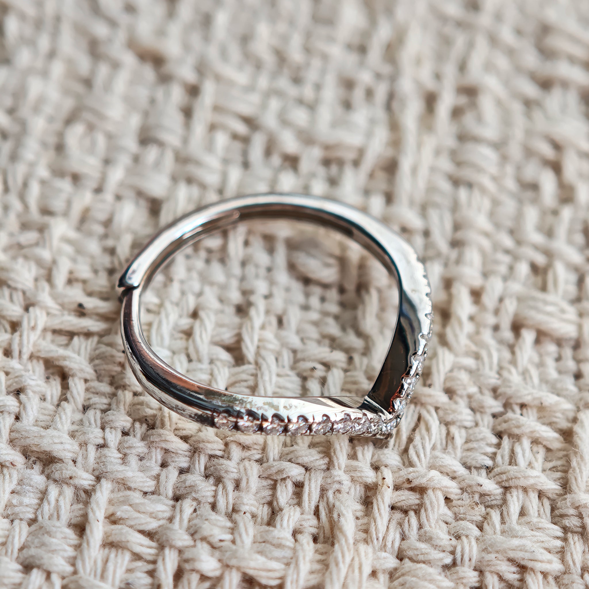 This S925 silver women's ring features an elegant crown-shaped heart design, pavé-set with sparkling moissanite stones along its curved band for a luminous, romantic appearance. Its open adjustable band allows for a comfortable, personalized fit on different finger sizes, blending delicate craftsmanship with timeless charm.