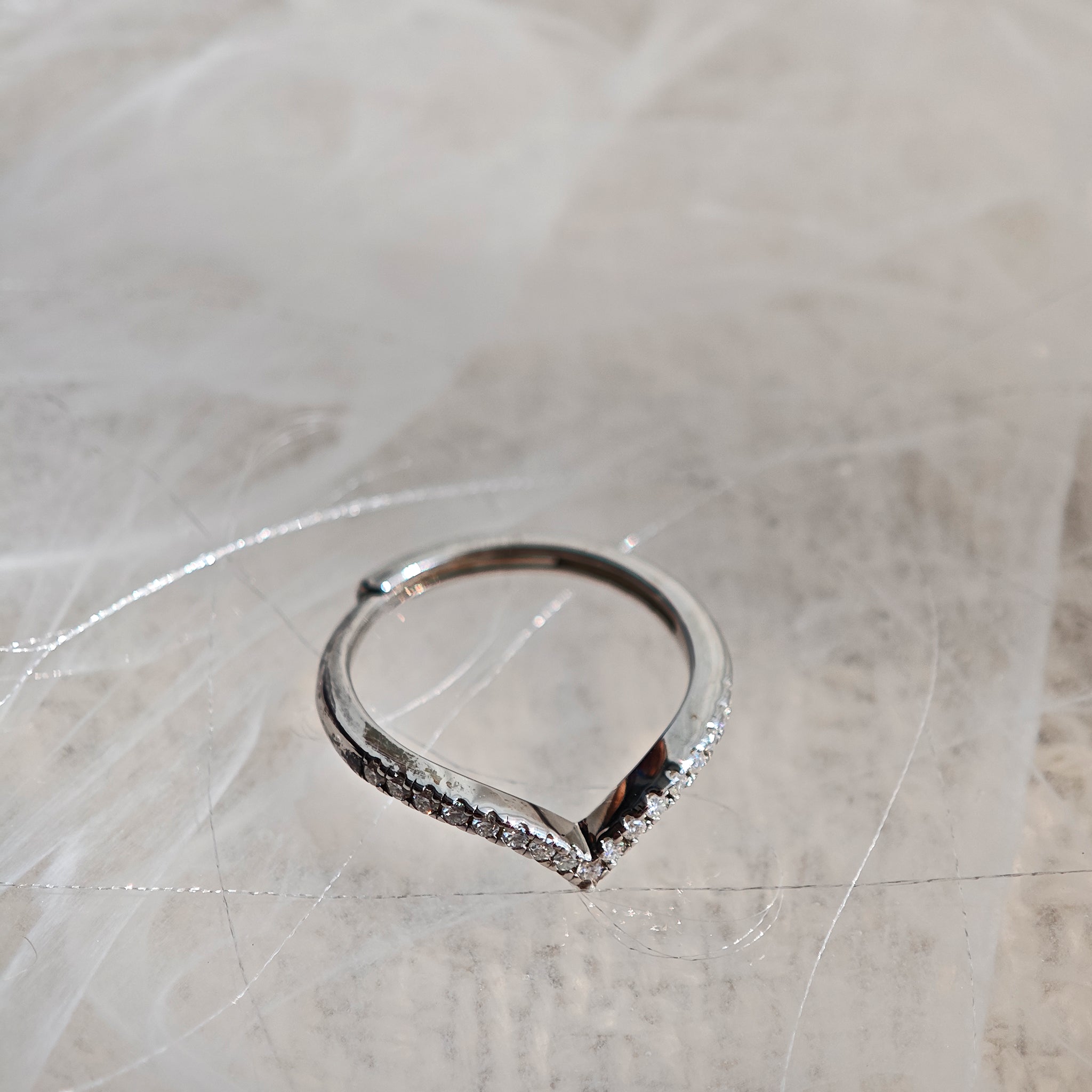 This S925 silver women's ring features an elegant crown-shaped heart design, pavé-set with sparkling moissanite stones along its curved band for a luminous, romantic appearance. Its open adjustable band allows for a comfortable, personalized fit on different finger sizes, blending delicate craftsmanship with timeless charm.